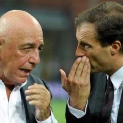 MILAN, ITALY - AUGUST 21:  AC Milan AD Adriano Galliani and head coach Massimiliano Allegri talk during the Berlusconi Trophy match between AC Milan and Juventus FC at Giuseppe Meazza Stadium on August 21, 2011 in Milan, Italy.  (Photo by Claudio Villa/Getty Images)