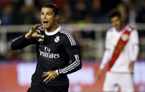 Real Madrid's Ronaldo celebrates after scoring a goal against Rayo Vallecano during their Spanish first division soccer match against Rayo Vallecano